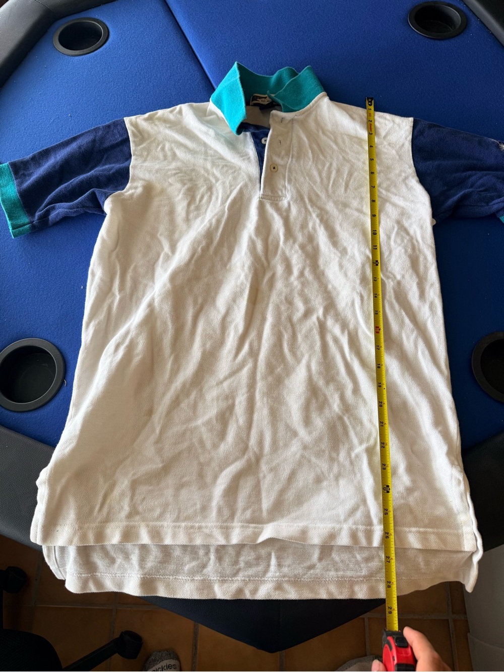 White Polo Shirt with Blue Sleeves and Teal Collar